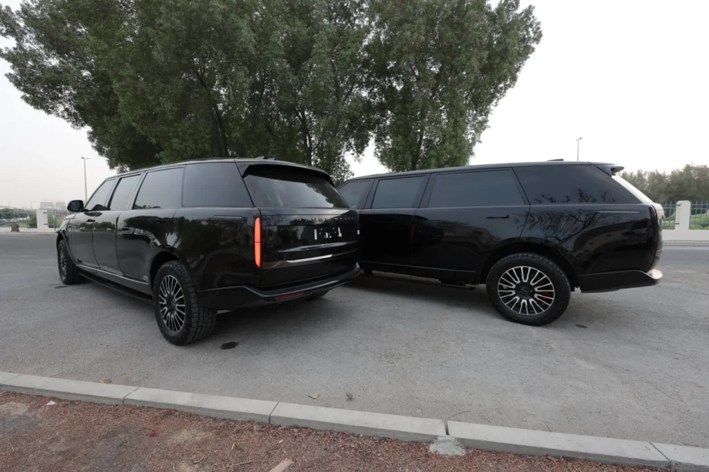 Two Range Rover BR6 P530 Extended armored SUVs back view SchutzCarr fleet