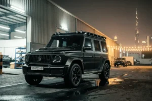 A Brabus G-Wagon parked outside a warehouse schutzcarr