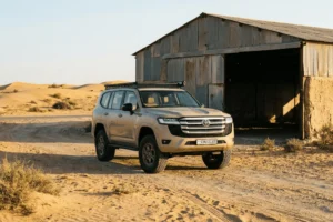 toyota Land Cruiser 300 GXR parked outside a warehouse